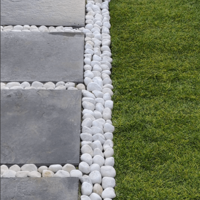 Garden designs with store pebbles and pavers